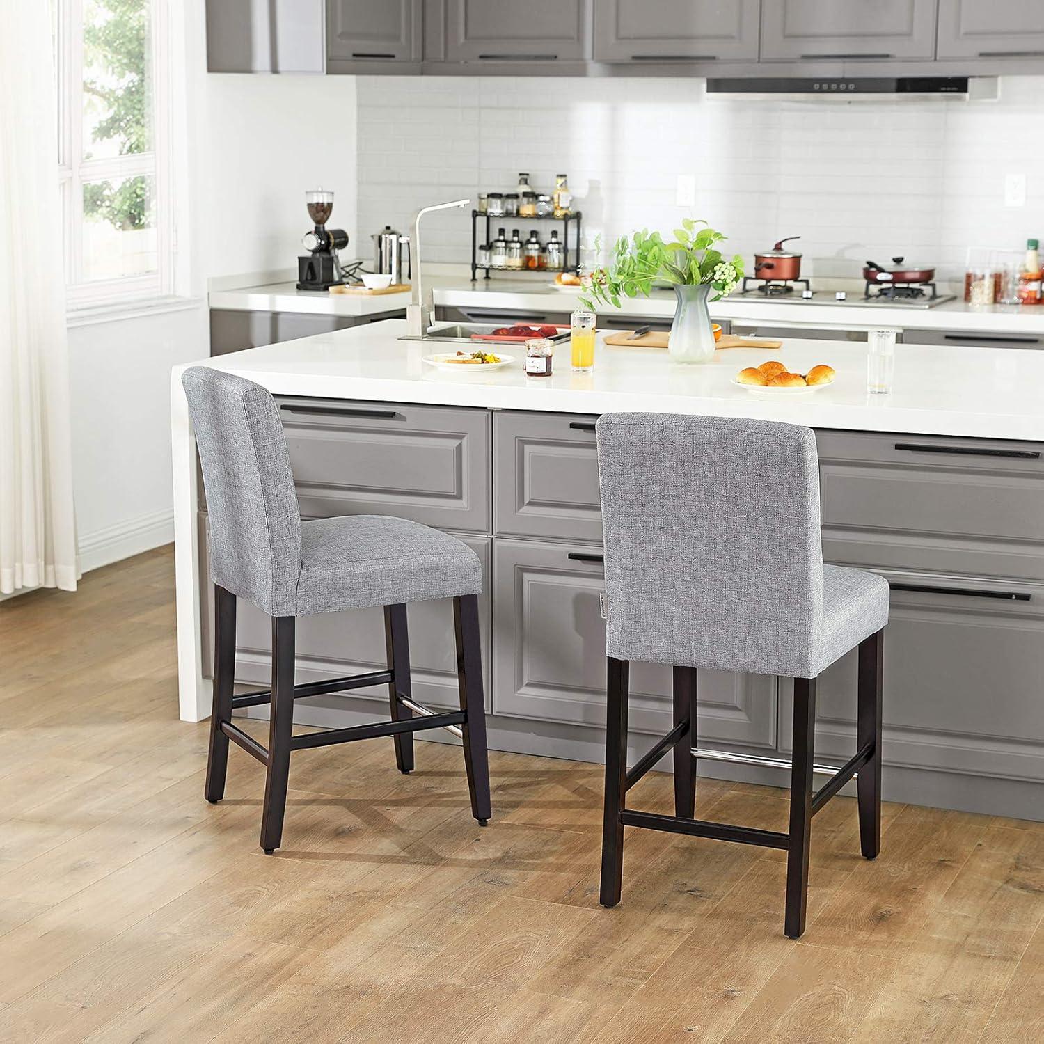 imageSONGMICS Set of 2 Counter Stools Kitchen Breakfast Chairs with Button Tufted Backrest LinenStyle Fabric Solid Wood Legs with Footrest Light Gray Seat height 24