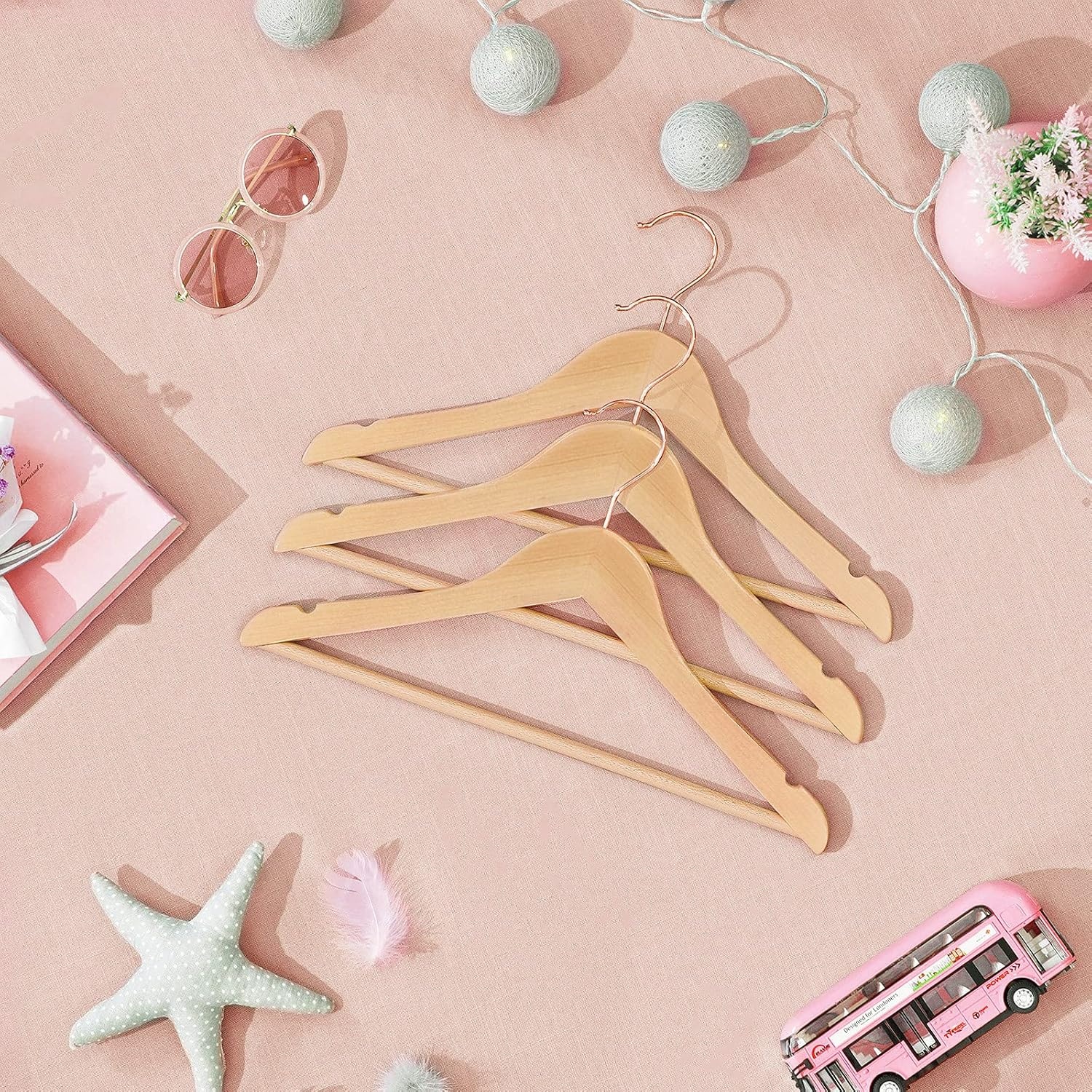 image:imageSONGMICS Kids Wooden Hangers 20 Pack Solid Wood Baby Hangers Childrens Coat Hangers with Pants Bar Shoulder Notches Swivel Hooks 126 x 75 Inches Natural and Rose Gold UCRW006N03